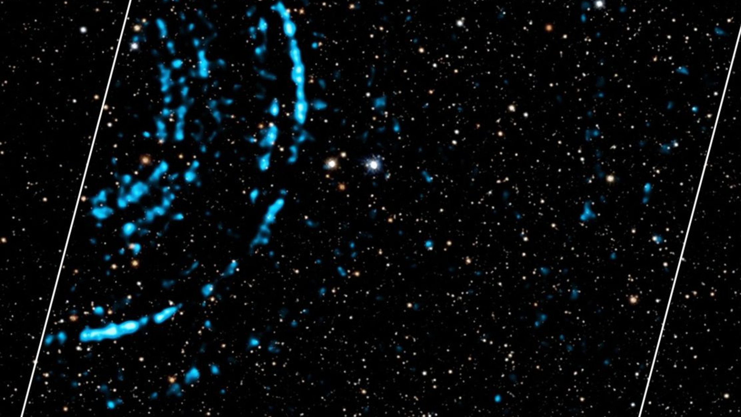 Concentric blue X-ray rings set against a starry background