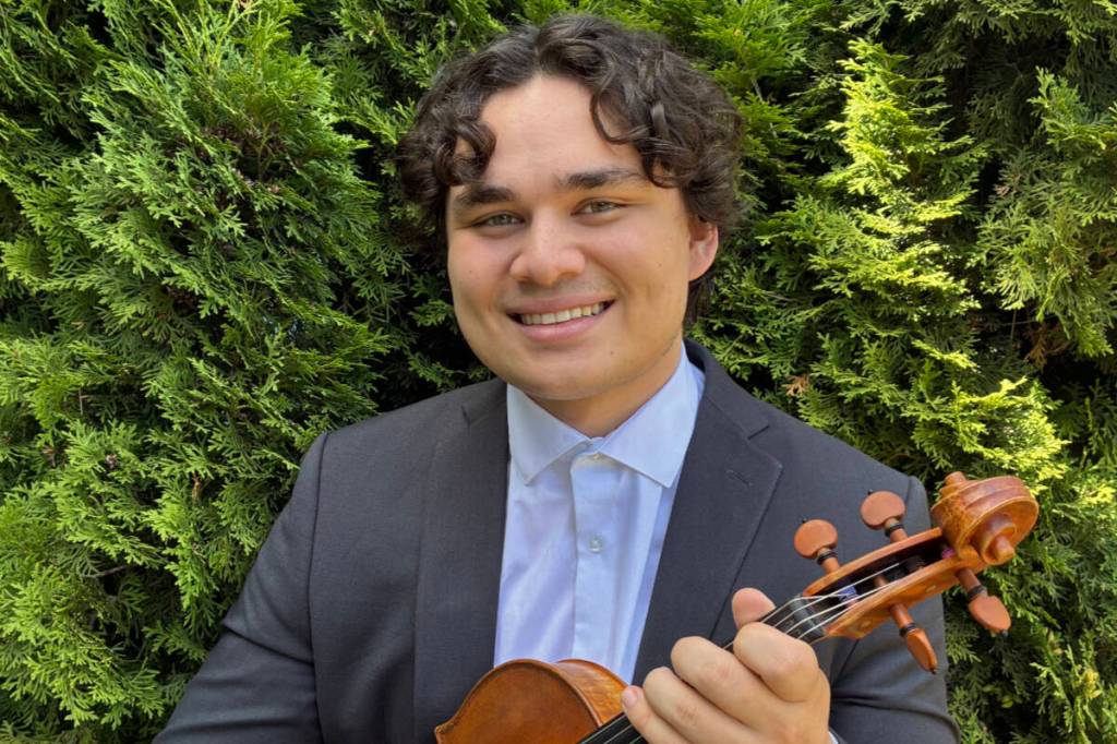 Andrew Loe, a University of Victoria medical student, is bringing together physicians from across the country to form Canada’s first doctors’ orchestra, an ensemble that aims to ease burnout among health care professionals while giving back to the communities they serve. (Courtesy of Andrew Loe)