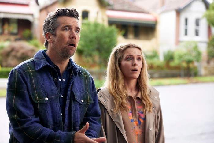 484607,Colin From Accounts S2 Patrick Brammall as Gordon and Harriet Dyer as Ashley in Colin From Accounts, looking shocked