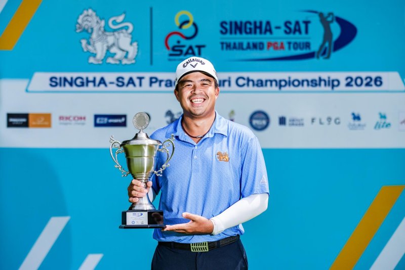 Nopparat Panichphol poses with the trophy. Supplied photo