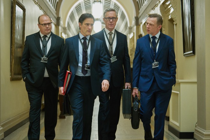 - Embargo 0001 Wedneday 12th February - The Uneclared War Series 2 - First Look Gavin Spokes as Head of MI6 Alex Sheldon, Ed Stoppard as Foreign Secretary Richard Marston, Alex Jennings as Director of GCHQ David Neal and Simon Pegg as Director of Operations at GCHQ Danny Patrick in The Undeclared War, walking down a corridor together