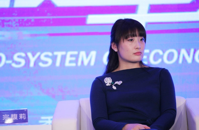 Kelly Zong, daughter of Wahaha Group founder Zong Qinghou, attends the 2015 NetEase Annual Economist Conference in Beijing, China, December 2014. Photo by Imaginechina via AFP