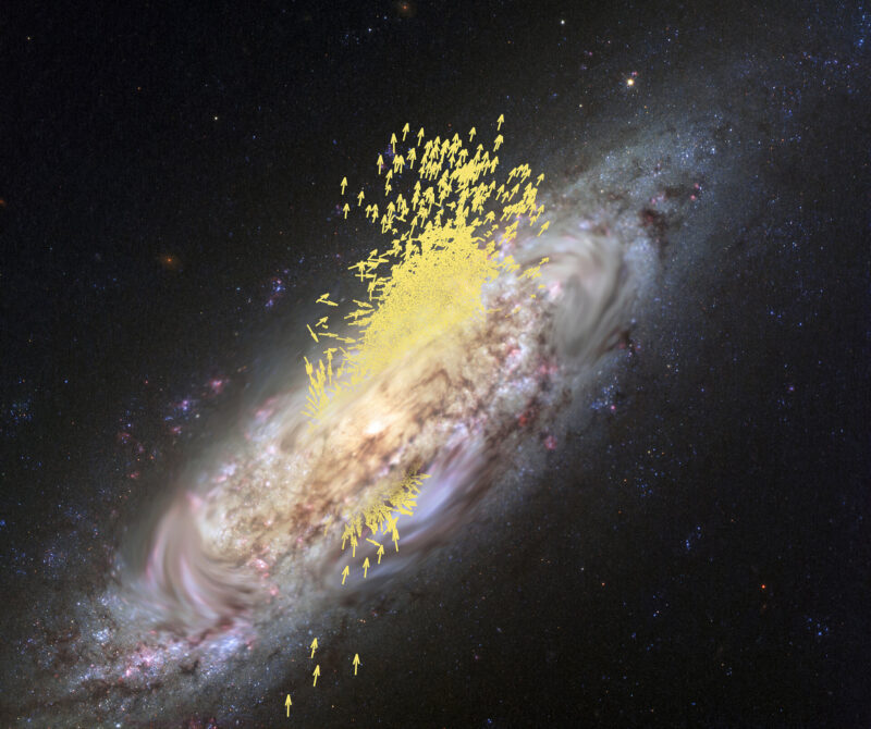 Oblique view of a spiral galaxy with very many little yellow arrows blasting through its center and on out.