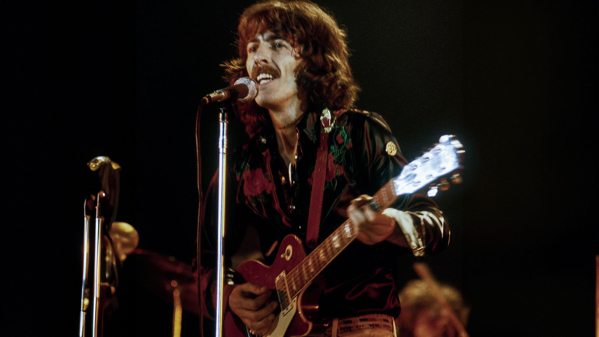 George Harrison performing at The Cow Palace in Daly City, California on November 7, 1974.