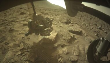 The Mars rover, Perseverance, uses a tool on its robotic arm called SHERLOC to examine a rock named Cheyava Falls. (Credit: NASA/JPL-Caltech)