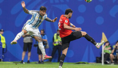An Argentine player heads the ball during a match against Egypt.