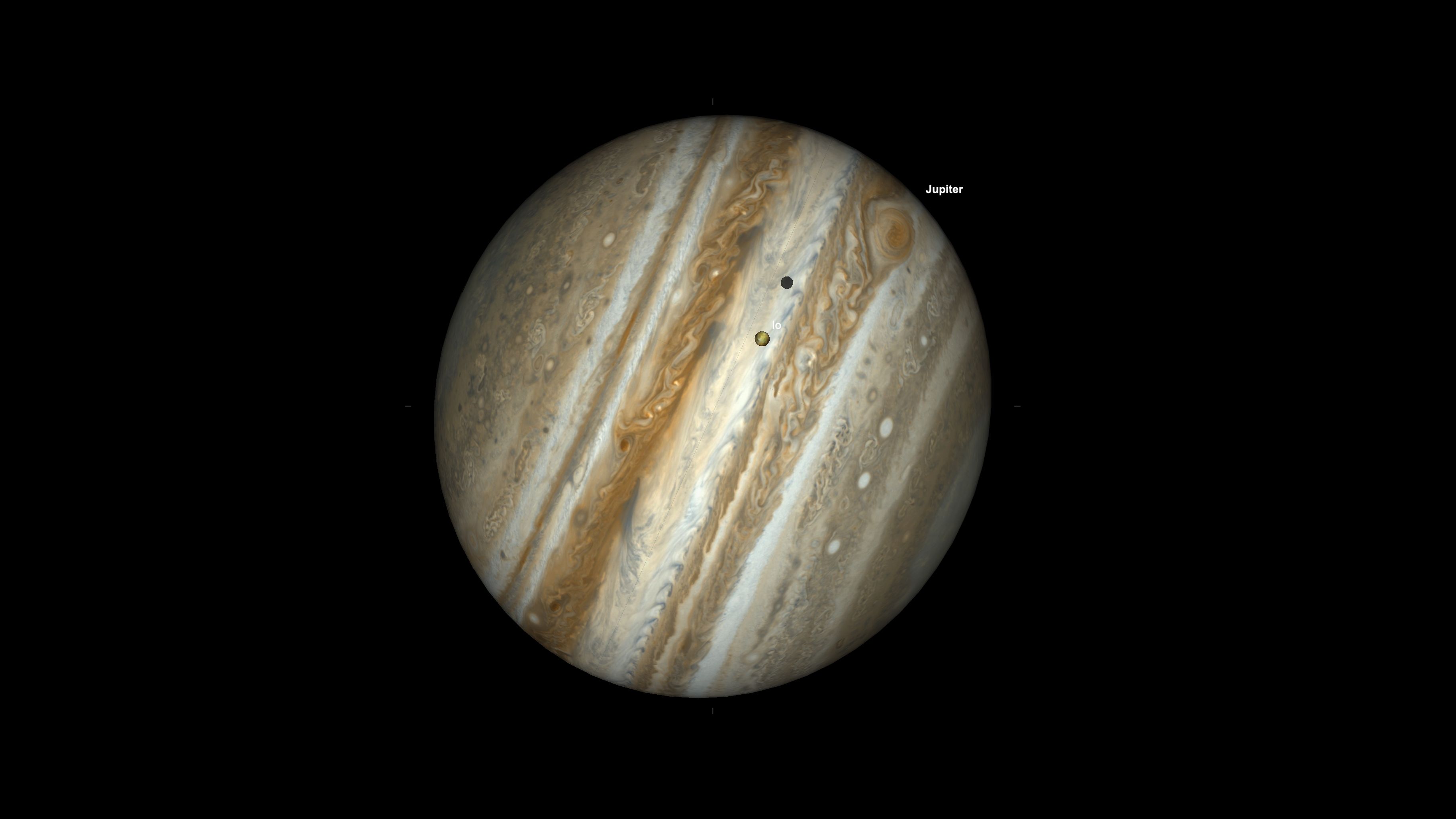 A representation of the gas giant Jupiter with the moon Io casting a shadow on its surface in a black sky.