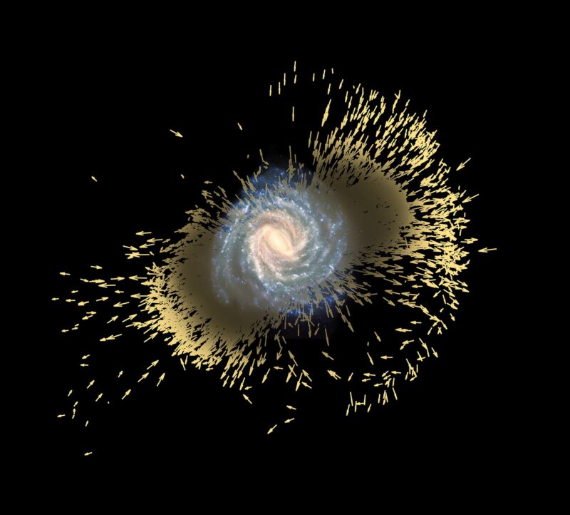 Face-on spiral galaxy with very many short yellow arrows around the edge, most going out, some going in.