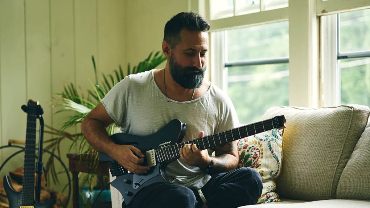 Jake Bowen plays a headless Strandberg S&auml;len Jazz NX 6.