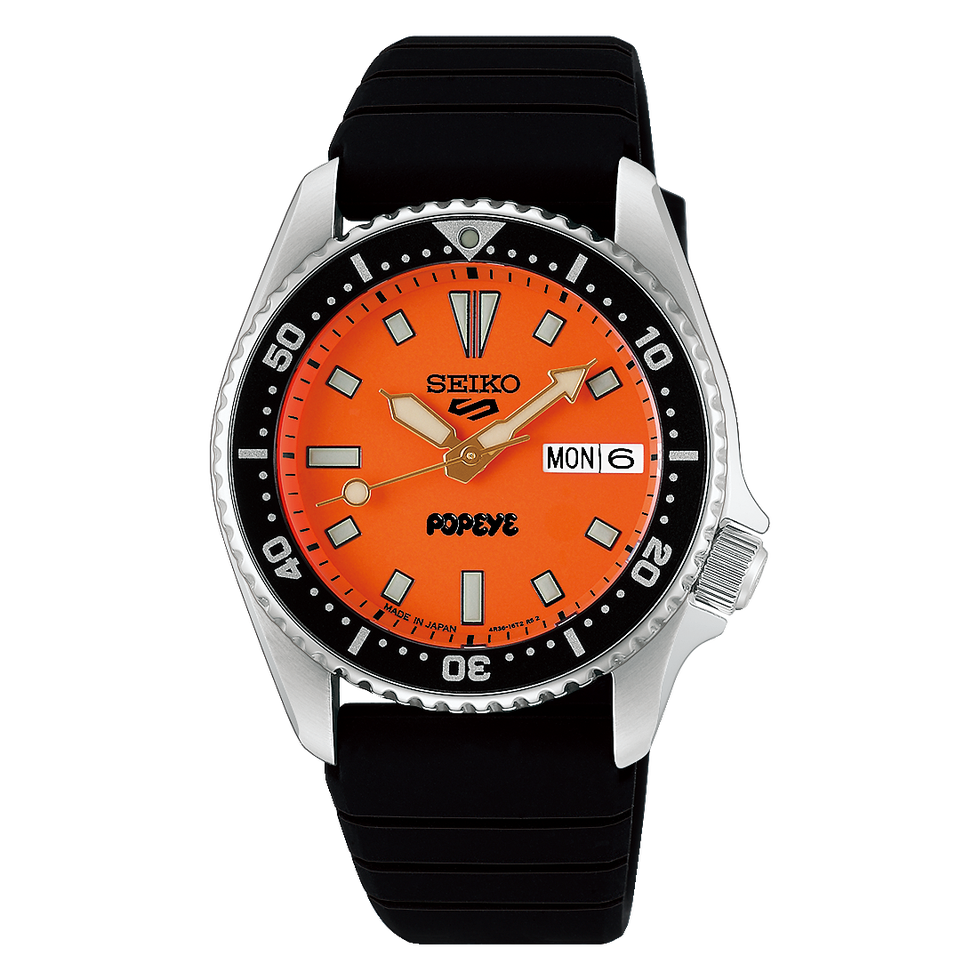 seiko watch with orange dial, popeye logo, and black strap. seiko watch with orange dial, popeye logo, and black strap.