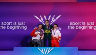 Singapore’s Toh Wei Soong celebrating his 50m freestyle S7 silver medal with winner Christian Sadie of South Africa and England’s bronze medallist Bruce Dee on the podium at the Tollcross International Swimming Centre in Glasgow on July 29.