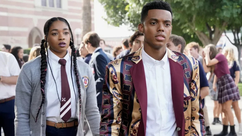 Lisa Wilkes (Simone Joy Jones) and Will Smith (Jabari Banks) stand outside their school in Bel-Air