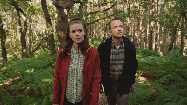 Kate Mara's Lana and Aaron Paul's Cliff walking in the woods on Black Mirror