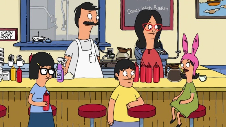 The Belchers sitting around the counter on Bob's Burgers S1E5