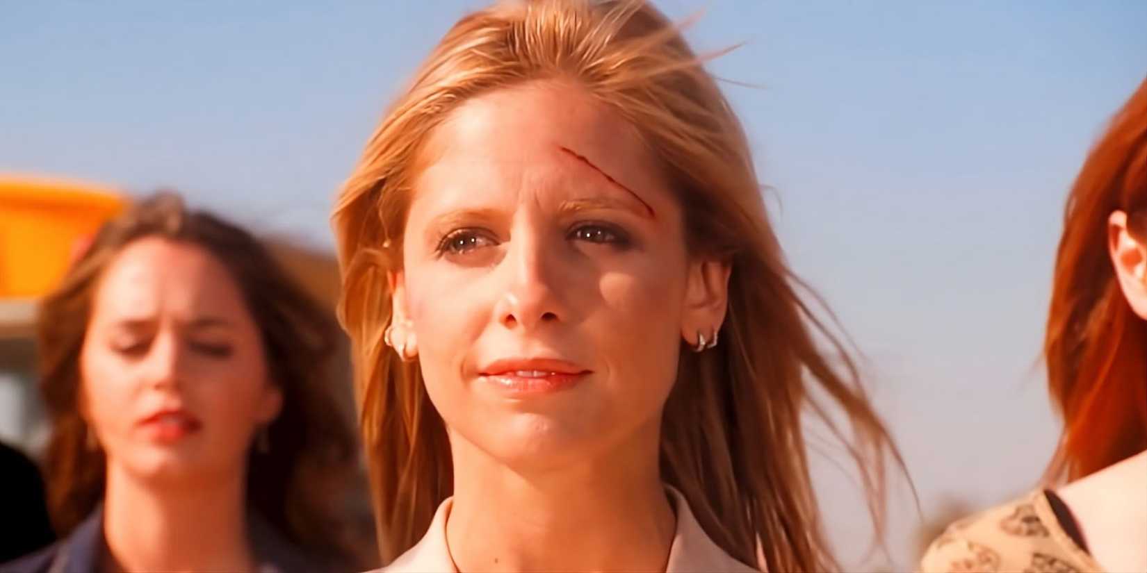 Buffy smiles, looking forward with a cut on her forehead in Buffy the Vampire Slayer series finale.