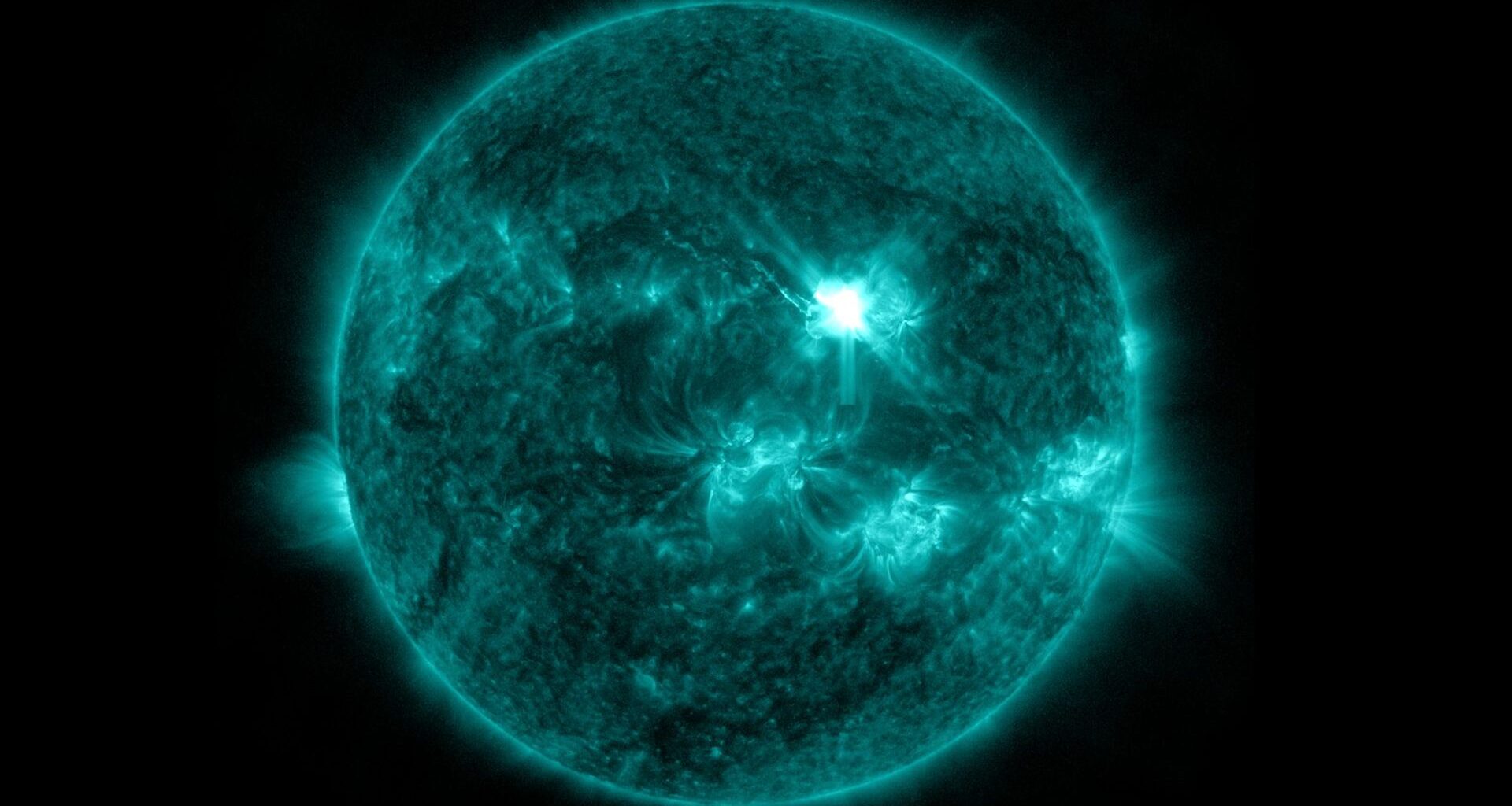 view of the sun showing a bright eruption near the center, this is the x-class flare erupting on June 30.