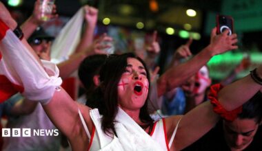 England fans revel as pubs stay open late for World Cup game against Mexico