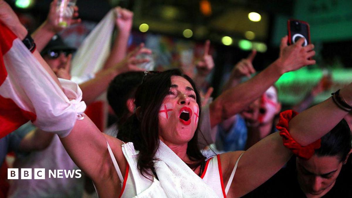 England fans revel as pubs stay open late for World Cup game against Mexico
