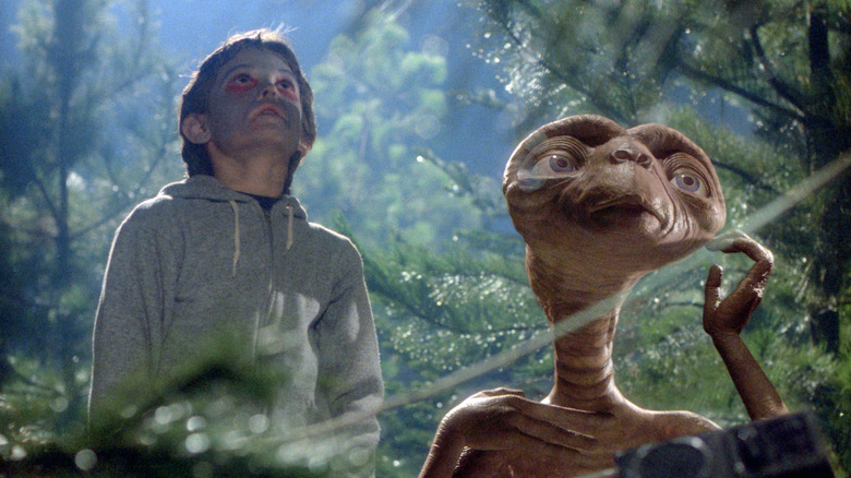 Elliot and E.T. looking upward in E.T. the Extra-Terrestrial (1982)