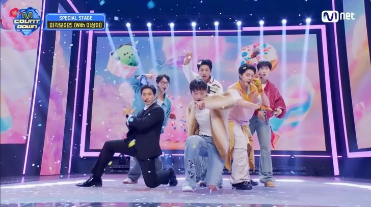 Fictional boy band Migak Boys from the drama series 'The Legend of Kitchen Soldier' takes the stage. Captured from Mnet K-pop's YouTube channel