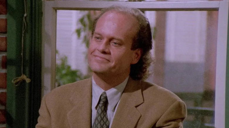 Frasier Crane (Kelsey Grammer) has coffee with his brother in Frasier