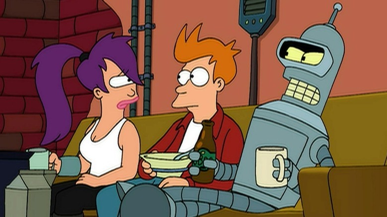 Leela, Fry, and Bender sitting on a couch on Futurama S3E9