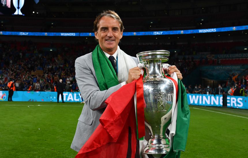 Roberto Mancini celebrates with The Henri Delaunay Trophy after Italy won the Euro 2020 final in London.