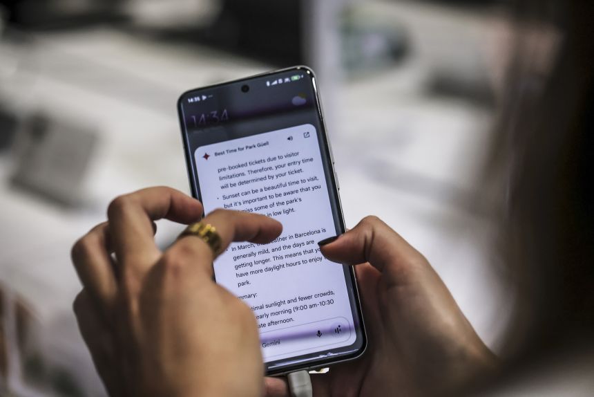 A user tests an AI function with Google Gemini on a Xiaomi 15 Ultra smartphonein Barcelona on March 3, 2024.