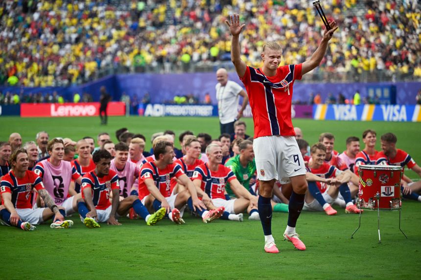 Norway’s forward Erling Braut Haaland plays the drum as Norway celebrates winning against Brazil at New York/New Jersey Stadium in East Rutherford on July 5.