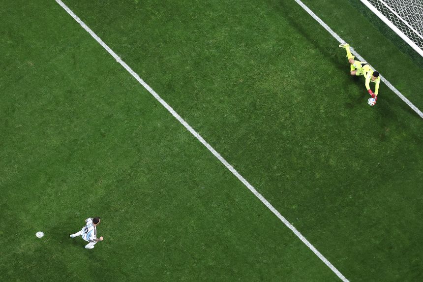 Mostafa Shoubir of Egypt makes a save against a penalty by Lionel Messi last week.