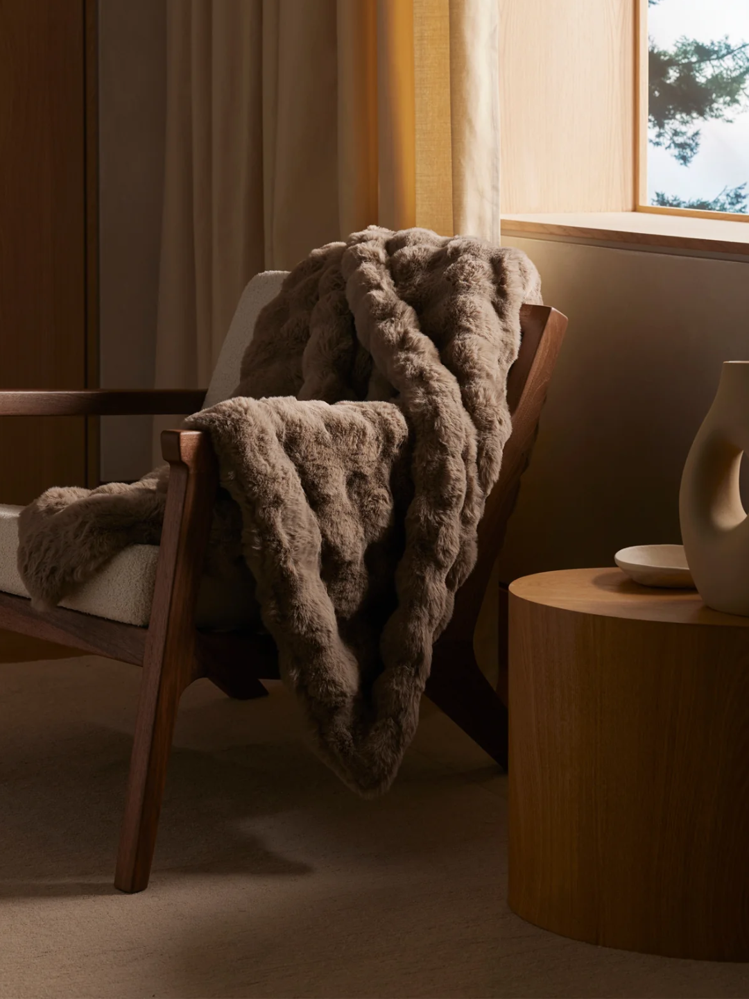 A brown bubble furry blanket from Cozy Earth