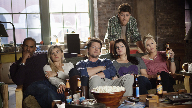 Brad Jane Dave Penny Alex and Max watching TV on Happy Endings