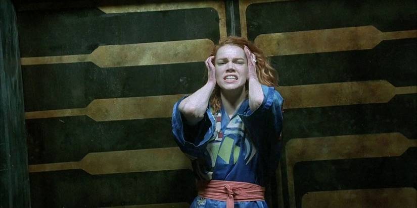 Stacey Travis playing the character Jill in a tense scene from the climax of the 1990 cyberpunk horror film Hardware