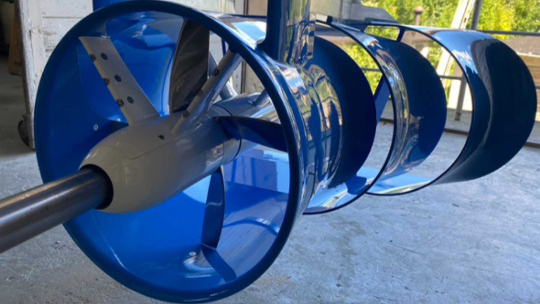 A 132-ton turbine has been lying on a Canadian riverbed since the only factory meant to build 39 more went bankrupt, and the man who put it there is asking to drop nine on the same spot and hundreds across North America