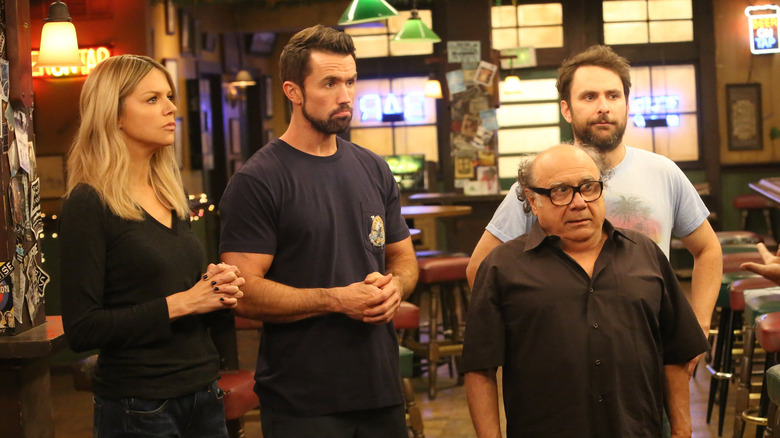 Dee Mac Frank and Charlie looking skeptical on It's Always Sunny in Philadelphia