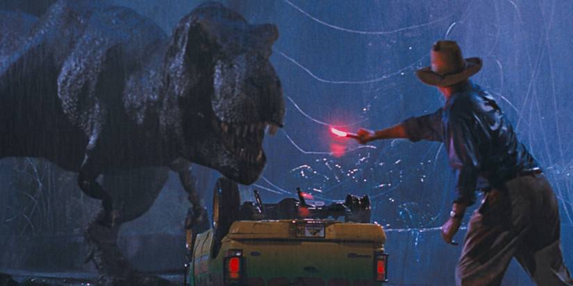 Sam Neill using a flare to attract a T.Rex in Jurassic Park