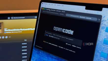 laptop screen displaying code editor with terminal window showing html and css programming