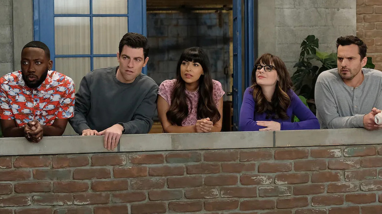 Winston Schmidt Cece Jess and Nick looking confused on their balcony in New Girl