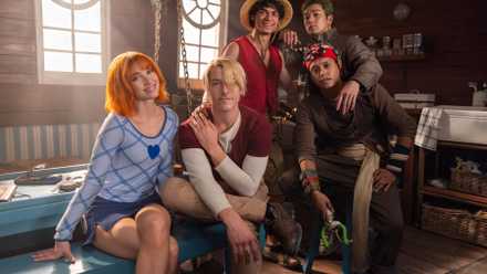 four men and a woman sit by each othe on set for Netflix's live-action One Piece season 2