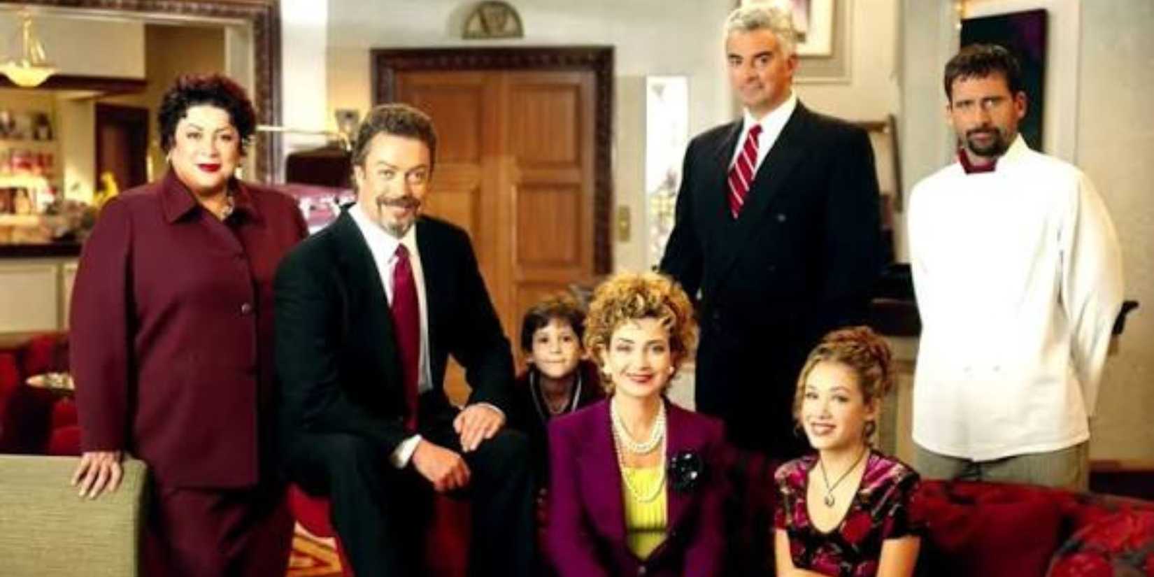The cast of 'Over the Top' featuring Liz Torres as Rose, Tim Curry as Simon Ferguson, Luke Tarsitano as Daniel Martin, Annie Potts as Hadley Martin, John O'Hurley as Robert McSwain, Marla Sokoloff as Gwen Martin, and Steve Carell as Yorgo Galfanikos.