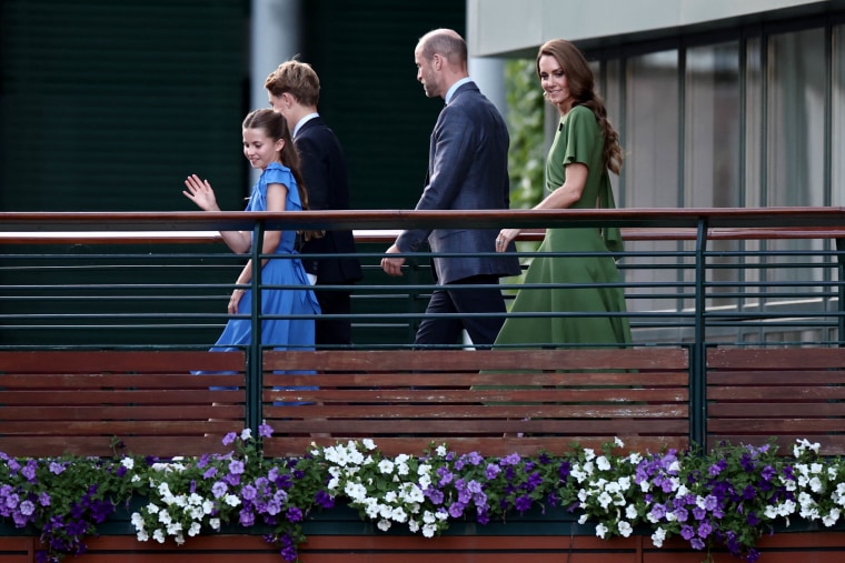 The royal family departs the men's singles final match. 