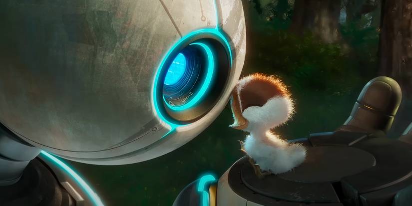 Roz holds a young, smiling Brightbill in her hand, looking at him closely in 'The Wild Robot'