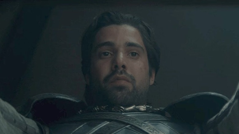 Fabien Frankle as Criston Cole looking down in House of the Dragon