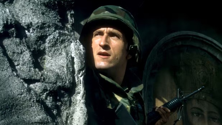 Frank (Jonathan LaPaglia) wearing combat gear on 