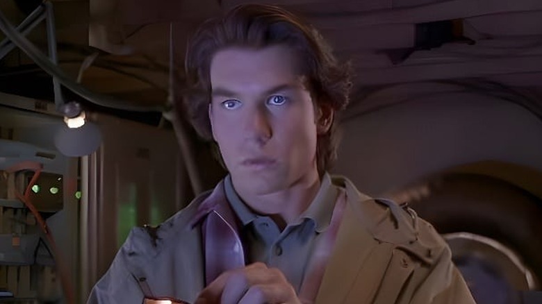 Quinn (Jerry O'Connell) pressing a remote control on "Sliders."