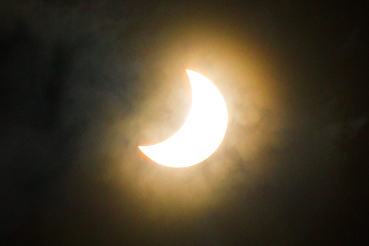 During a solar eclipse, the Moon takes a 'bite' out of the Sun. Credit: Artur Debat / Getty Images