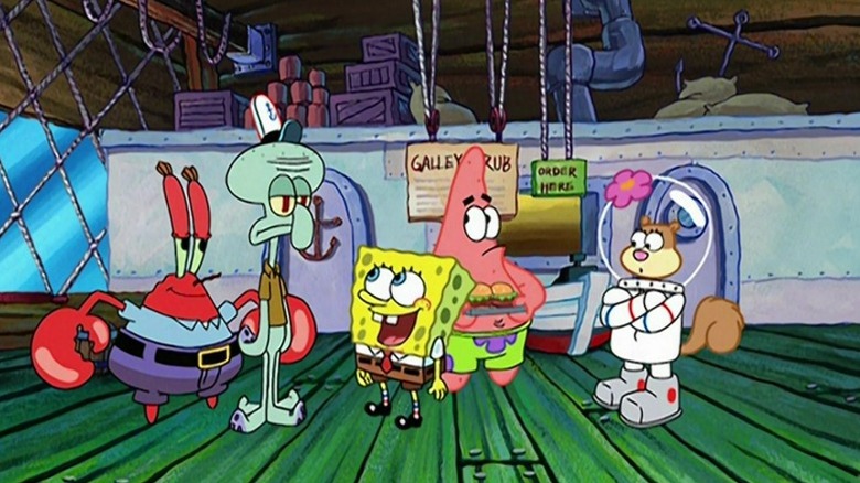 Mr. Krabs, Squidward, SpongeBob, Patrick, and Sandy standing in the Krusty Krab on SpongeBob SquarePants S2E12