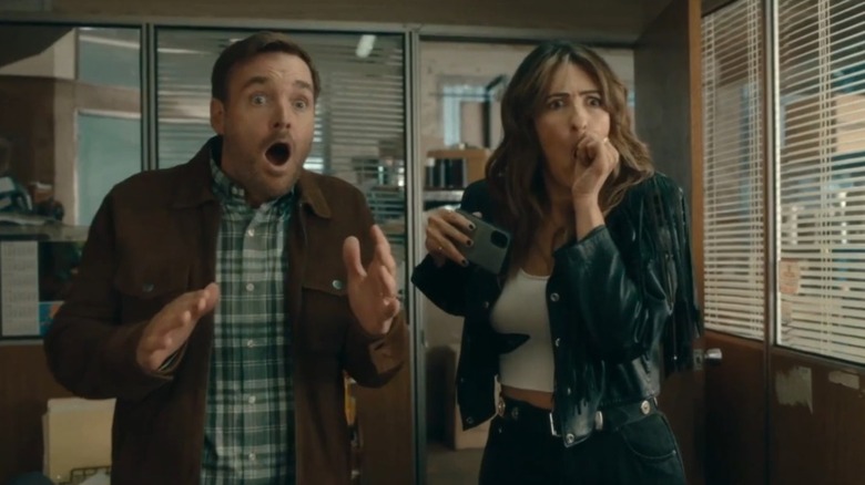 Martin and Vicki looking scared in an office