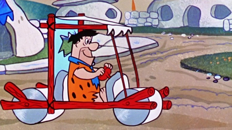 Fred driving his car on The Flintstones S1E5