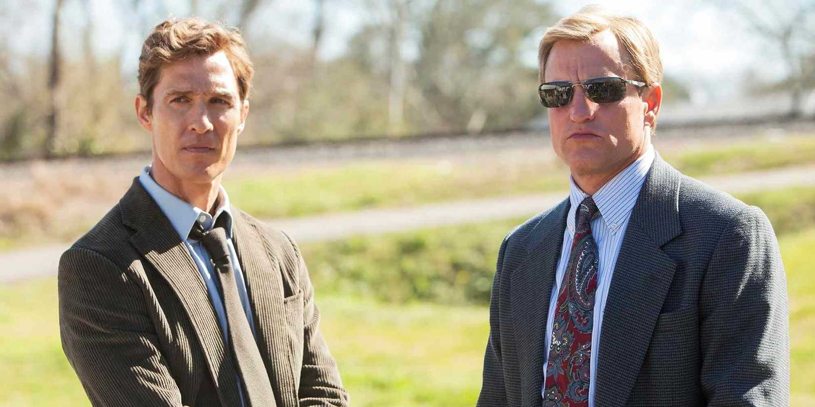 Matthew McConaughey and Woody Harrelson standing side-by-side in 'True Detective' Season 1